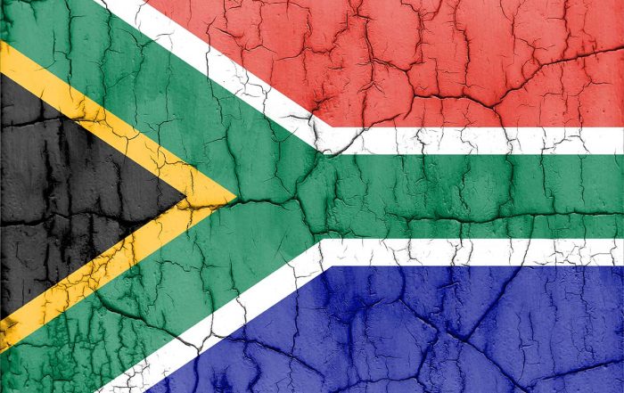 Textured photo of the flag of south africa with cracks
