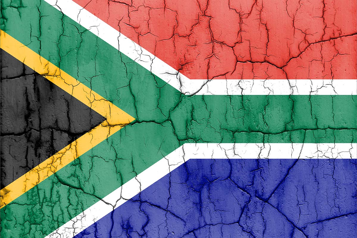 Textured photo of the flag of south africa with cracks